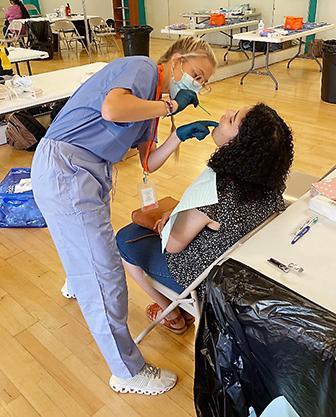 woman getting dental exam