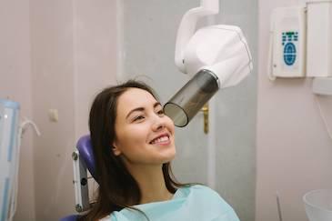 Woman at dentist | Extractions in Jonesboro AR