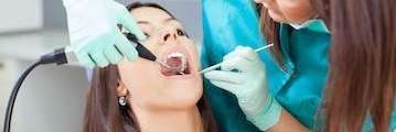 Woman getting a dental exam
