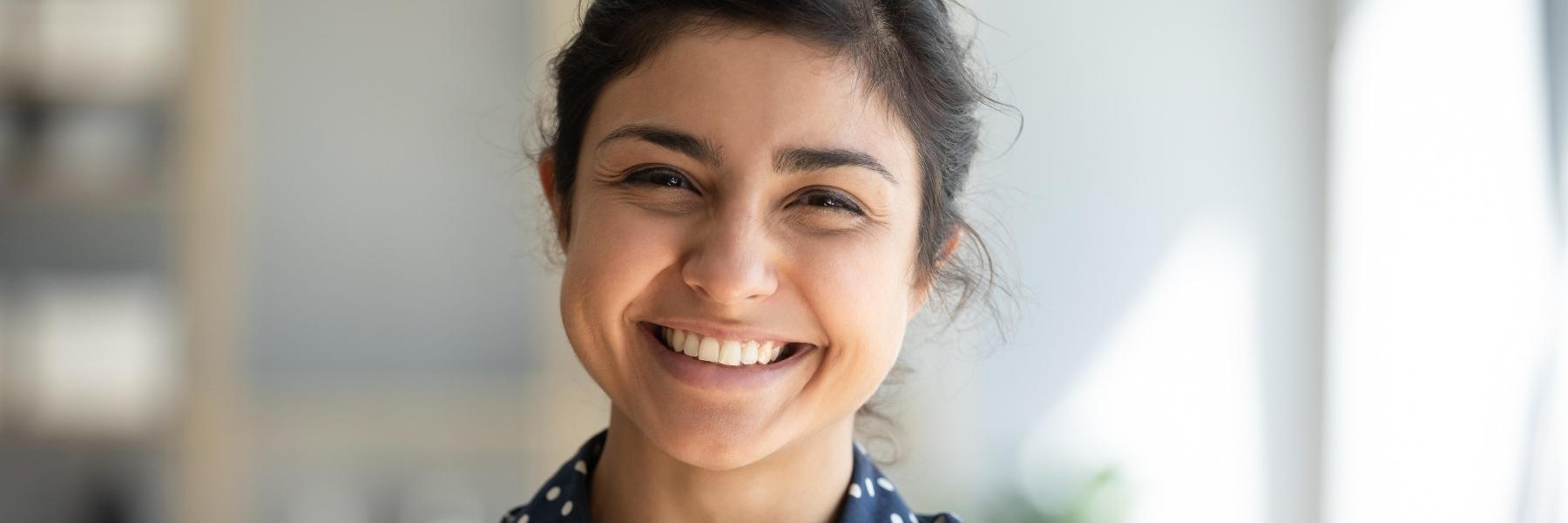 woman with dental implants in jonesboro ar