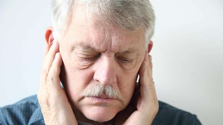 A man experiencing jaw pain | TMJ Jonesboro