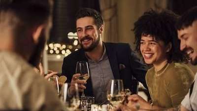A group of friends having dinner