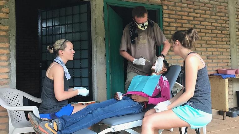 Dr. Bartels providing charity dental work in Puerto Rico