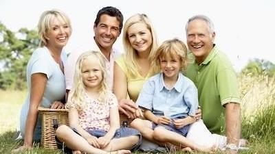 Smiling family having a picnic