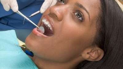 woman getting a dental exam | Jonesboro, AR