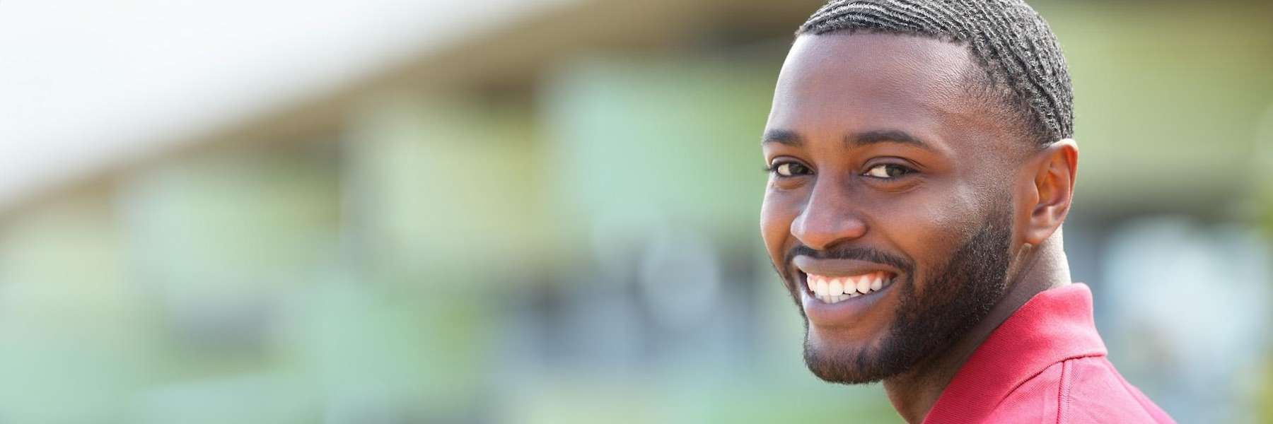 A smiling man outside | family dentist Jonesboro