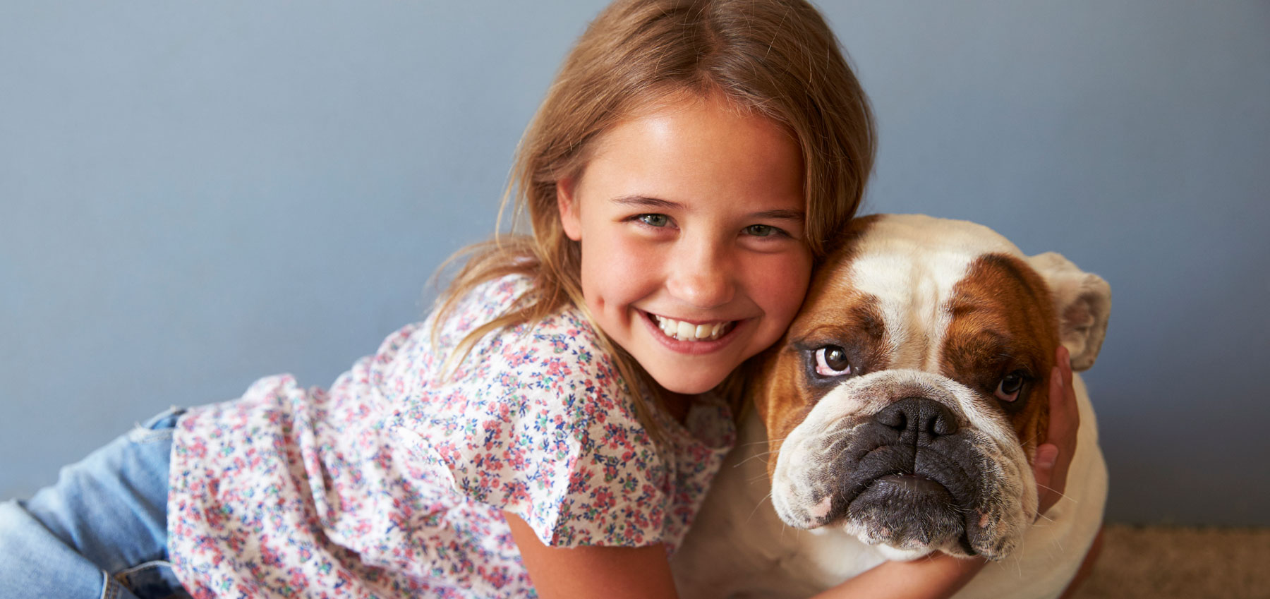 Anthony Bartels DDS Girl and dog
